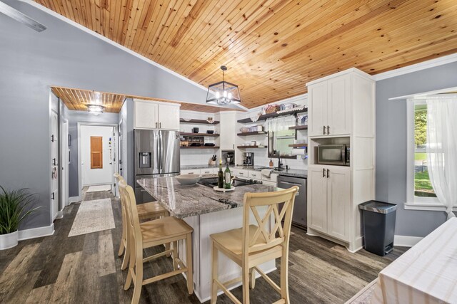 60 Pin Oak Dr, Lonoke, AR 72086 - kitchen featuring stainless steel appliances, wooden ceiling, lofted ceiling, open shelves, and white cabinetry