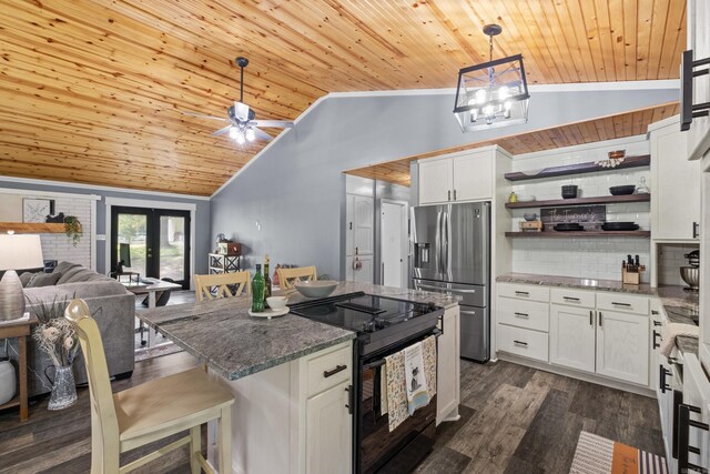 60 Pin Oak Dr, Lonoke, AR 72086 - kitchen featuring black range with electric cooktop, stainless steel fridge, vaulted ceiling, wooden ceiling, and tasteful backsplash
