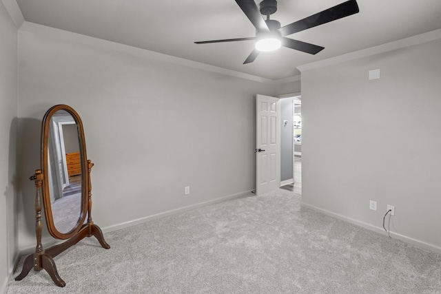 60 Pin Oak Dr, Lonoke, AR 72086 - carpeted spare room with ceiling fan and ornamental molding