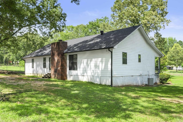 60 Pin Oak Dr, Lonoke, AR 72086 - view of side of home featuring entry steps, crawl space, a chimney, a lawn, and a shingled roof