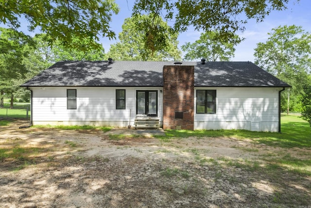 60 Pin Oak Dr, Lonoke, AR 72086 - back of house featuring french doors, a chimney, roof with shingles, entry steps, and crawl space