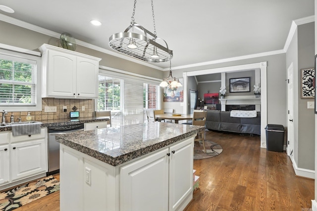 28 Chemin Ct, Little Rock, AR 72223 - kitchen featuring stainless steel dishwasher, crown molding, a kitchen island, white cabinetry, and dark wood-style flooring
