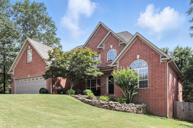 28 Chemin Ct, Little Rock, AR 72223 - traditional home with brick siding and an attached garage