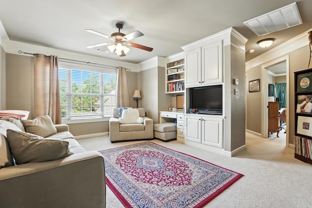 28 Chemin Ct, Little Rock, AR 72223 - living area with light colored carpet, ceiling fan, and ornamental molding