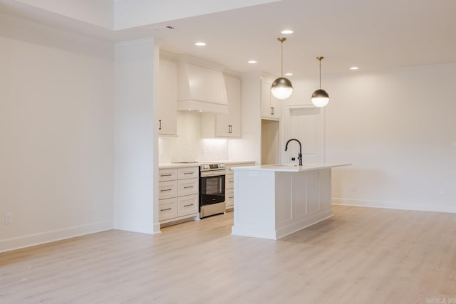 127 Edgewood Cir, Little Rock, AR 72223 - kitchen featuring custom exhaust hood, stainless steel range with electric stovetop, light wood-type flooring, white cabinetry, and recessed lighting