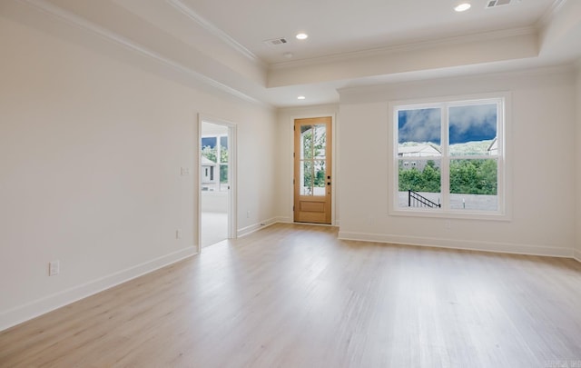 127 Edgewood Cir, Little Rock, AR 72223 - unfurnished room with a tray ceiling, light wood-style floors, crown molding, and recessed lighting