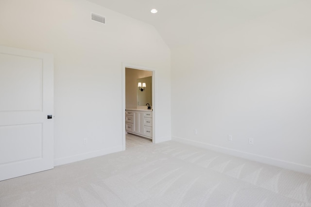 127 Edgewood Cir, Little Rock, AR 72223 - unfurnished bedroom featuring light colored carpet, vaulted ceiling, ensuite bathroom, and recessed lighting