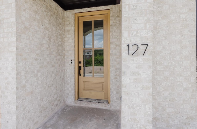 127 Edgewood Cir, Little Rock, AR 72223 - doorway to property featuring brick siding