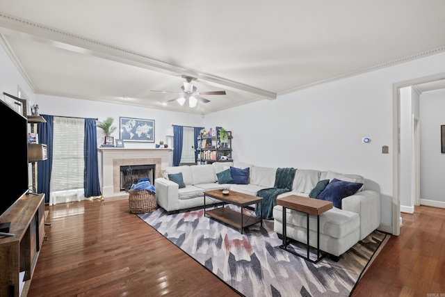 69 Saint Thomas Cir, Little Rock, AR 72211 - living area featuring wood finished floors, a ceiling fan, a tiled fireplace, and ornamental molding