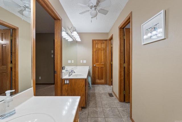 105 Little Creek Rd, Sherwood, AR 72120 - full bath with ceiling fan, vanity, tile patterned flooring, and a textured ceiling