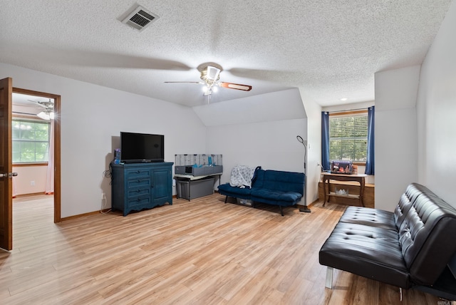 105 Little Creek Rd, Sherwood, AR 72120 - living area with ceiling fan, light wood-style flooring, and a textured ceiling