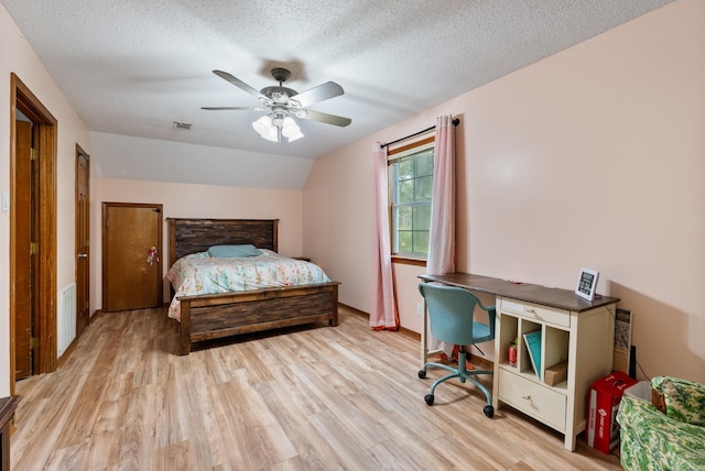 105 Little Creek Rd, Sherwood, AR 72120 - bedroom featuring wood finished floors, a textured ceiling, ceiling fan, and a desk