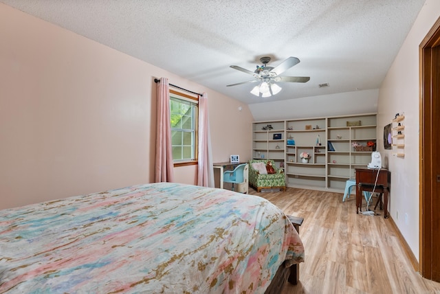 105 Little Creek Rd, Sherwood, AR 72120 - bedroom with wood finished floors, a textured ceiling, and a ceiling fan