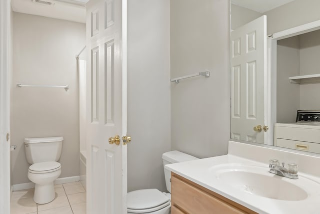 1607 W Washington Ave, Jonesboro, AR 72401 - bathroom featuring vanity and tile patterned floors