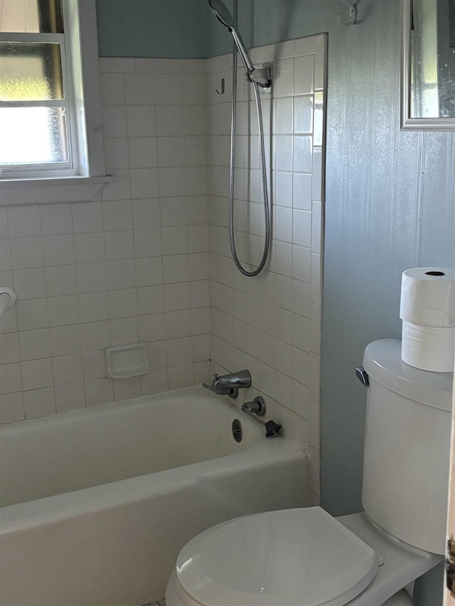 1702 S Ruddle Rd, Blytheville, AR 72315 - bathroom featuring plenty of natural light and bathtub / shower combination