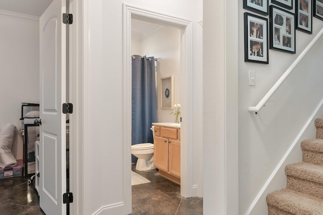 5201 Providence Cir, Jonesboro, AR 72404 - corridor with crown molding, stairs, and finished concrete floors