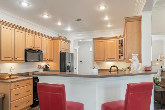 5201 Providence Cir, Jonesboro, AR 72404 - kitchen with black appliances, a breakfast bar area, crown molding, a peninsula, and glass insert cabinets