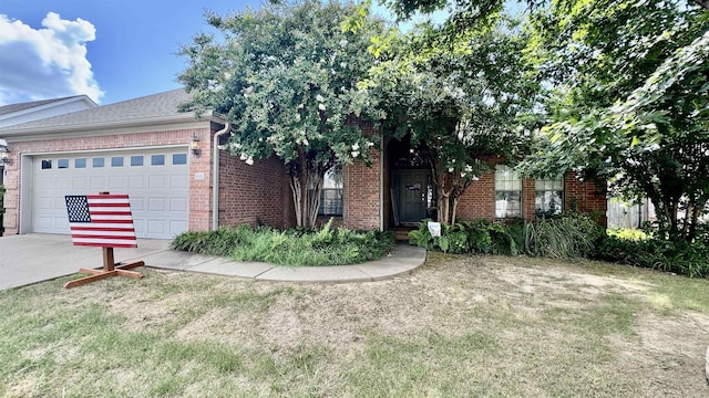 1695 Gardenia, Conway, AR 72034 - view of front facade with brick siding, an attached garage, concrete driveway, and a front yard