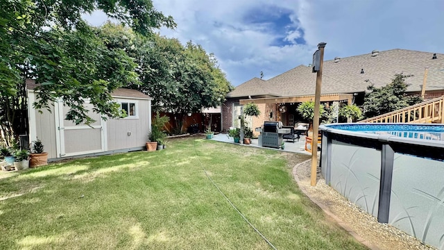 1695 Gardenia, Conway, AR 72034 - fenced backyard with a storage unit, an outdoor pool, and a patio area