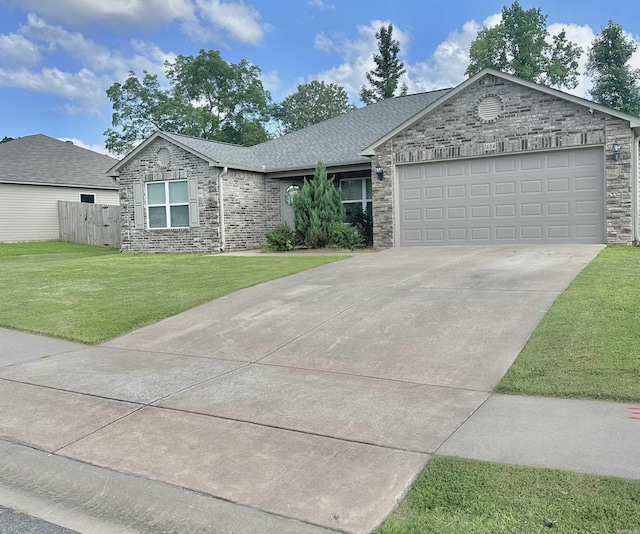 ranch-style house featuring driveway, an attached garage, and roof with shingles