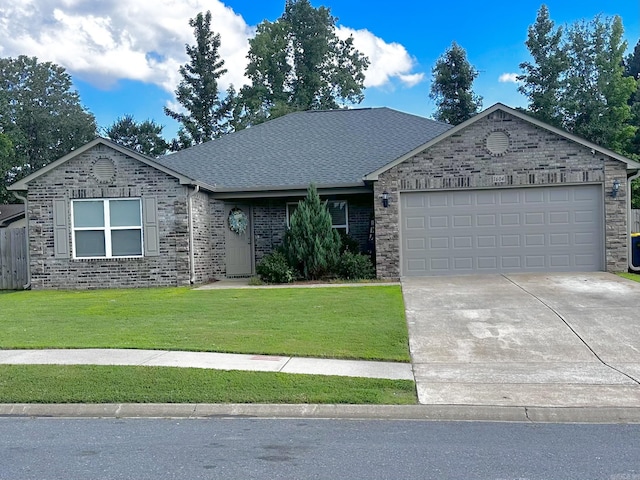 single story home with a front lawn, a garage, concrete driveway, a shingled roof, and brick siding