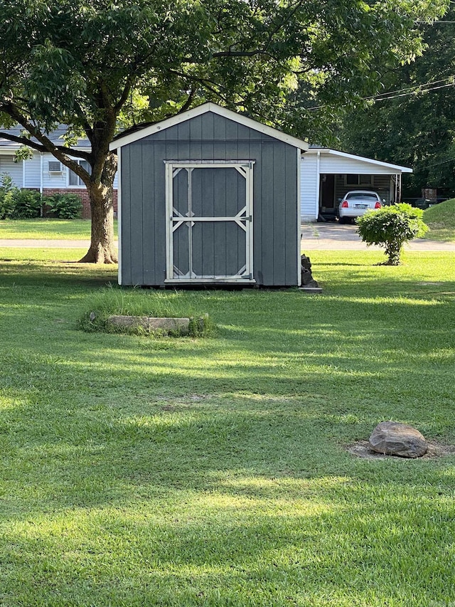 view of shed with a carport