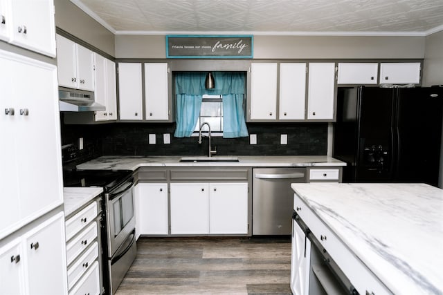 1700 Chitwood St, Benton, AR 72019 - kitchen featuring stainless steel appliances, an ornate ceiling, under cabinet range hood, dark wood-type flooring, and tasteful backsplash