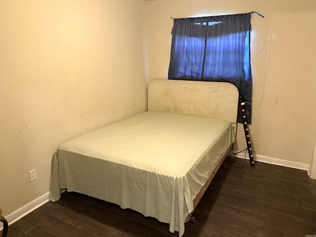 2111 Whyte Dr, North Little Rock, AR 72117 - bedroom with dark wood-style floors