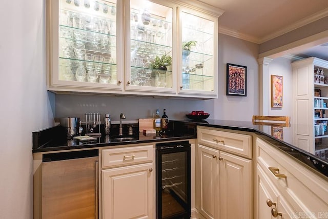 5336 N Grandview, Little Rock, AR 72207 - indoor wet bar with beverage cooler, ornamental molding, and fridge