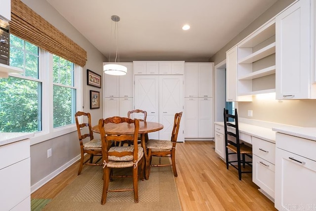 5336 N Grandview, Little Rock, AR 72207 - dining room with built in study area, light wood-style flooring, and recessed lighting