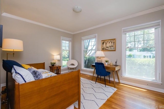 5336 N Grandview, Little Rock, AR 72207 - bedroom with wood finished floors and crown molding