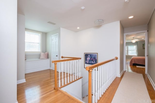 5336 N Grandview, Little Rock, AR 72207 - hall with an upstairs landing, light wood-style floors, and recessed lighting