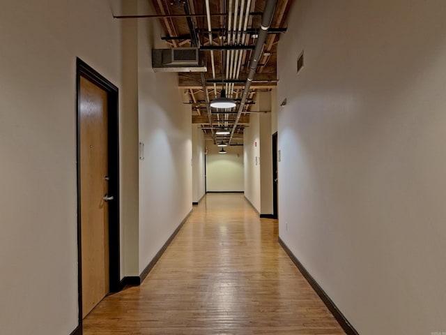 423 E 3rd St Unit 216, Little Rock, AR 72201 - corridor with light wood-style flooring and a towering ceiling