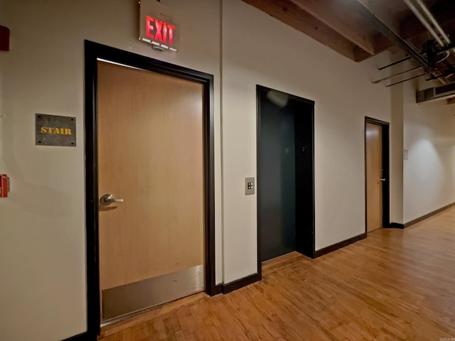 423 E 3rd St Unit 216, Little Rock, AR 72201 - hall featuring light wood-type flooring and elevator