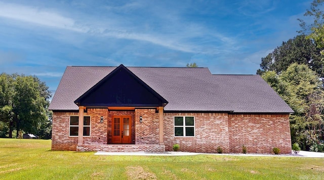 270 Arrowhead Rd, Greenbrier, AR 72058 - view of front of property with a front yard, brick siding, and french doors