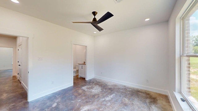 270 Arrowhead Rd, Greenbrier, AR 72058 - unfurnished bedroom with concrete floors, recessed lighting, ensuite bathroom, and a ceiling fan