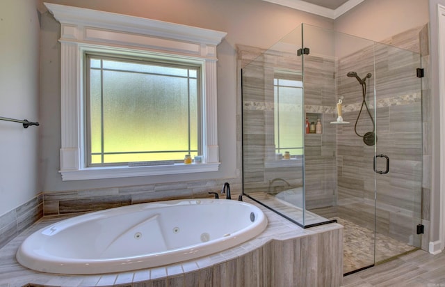 7517 Garden Way, Sherwood, AR 72120 - bathroom featuring a shower stall, a tub with jets, and crown molding