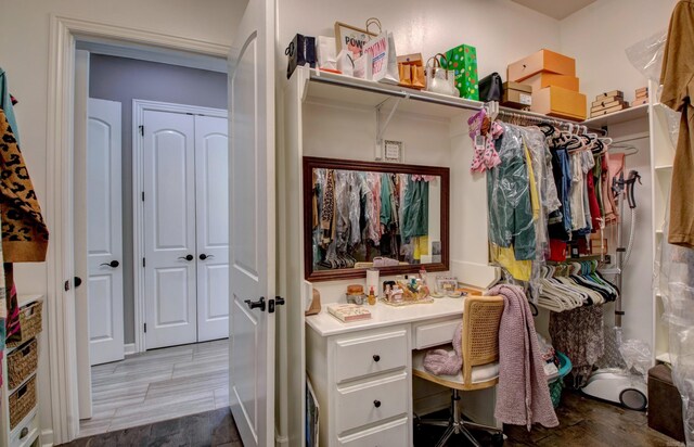 7517 Garden Way, Sherwood, AR 72120 - walk in closet featuring built in desk