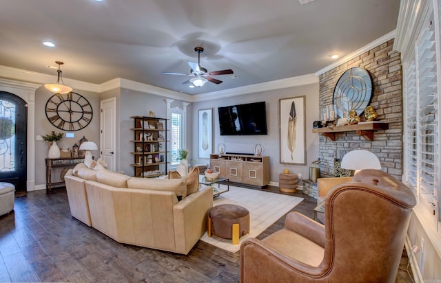 7517 Garden Way, Sherwood, AR 72120 - living room with dark wood-type flooring, plenty of natural light, a ceiling fan, a stone fireplace, and recessed lighting