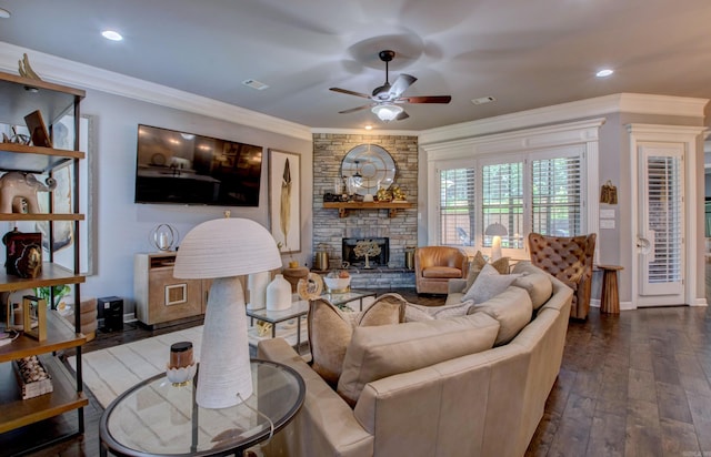7517 Garden Way, Sherwood, AR 72120 - living area with a ceiling fan, dark wood finished floors, ornamental molding, a fireplace, and recessed lighting