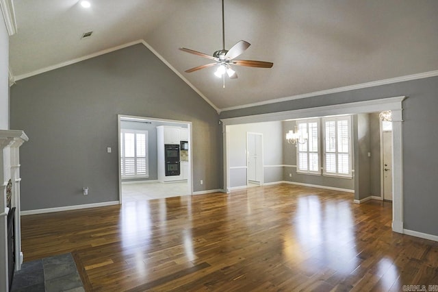 1224 N Pt, North Little Rock, AR 72118 - unfurnished living room featuring a ceiling fan, a chandelier, plenty of natural light, high vaulted ceiling, and wood finished floors