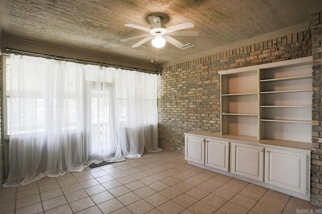 1224 N Pt, North Little Rock, AR 72118 - empty room with a ceiling fan, brick wall, and light tile patterned flooring