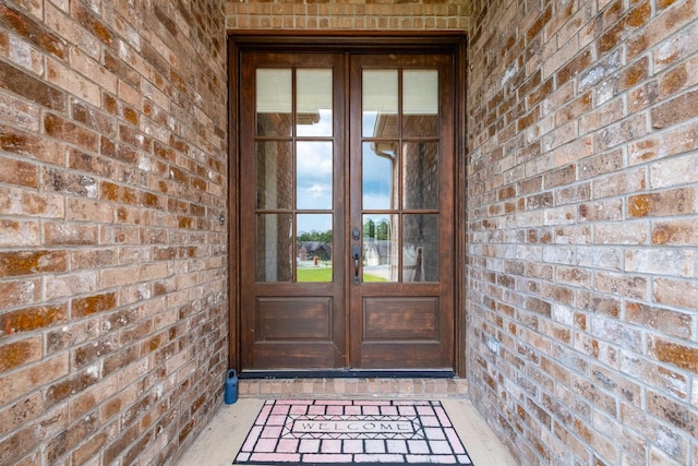 8 Flint Creek Ct, Little Rock, AR 72223 - entrance to property with french doors and brick siding