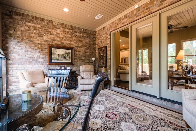 8 Flint Creek Ct, Little Rock, AR 72223 - living room with wooden ceiling, ornamental molding, ceiling fan, and brick wall