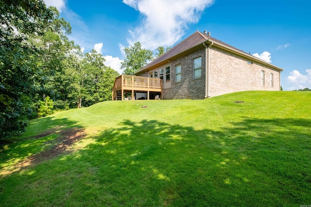 8 Flint Creek Ct, Little Rock, AR 72223 - back of house featuring a deck, a lawn, and brick siding