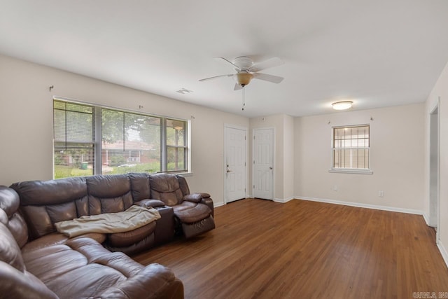 6815 W 34th St, Little Rock, AR 72204 - living area featuring plenty of natural light, wood finished floors, and ceiling fan