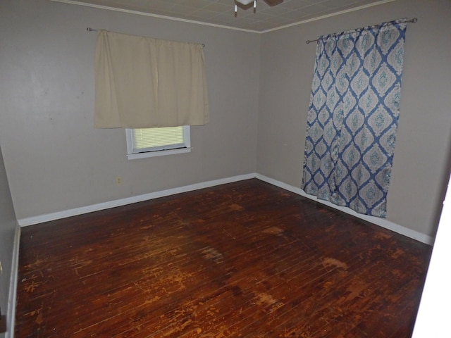 110 E First St, Hardy, AR 72542 - unfurnished room featuring dark wood-style floors, ornamental molding, and a ceiling fan