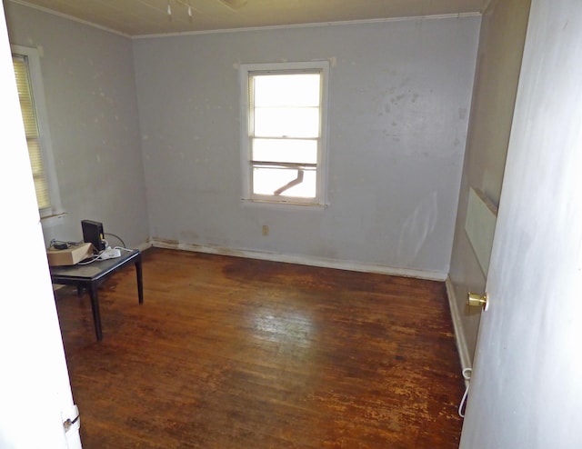 110 E First St, Hardy, AR 72542 - empty room featuring ornamental molding and wood finished floors