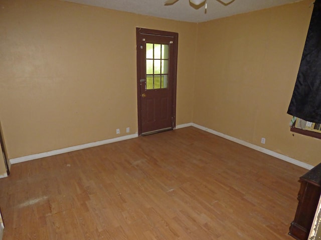 104 W First St, Hardy, AR 72542 - spare room featuring light wood-style flooring and ceiling fan