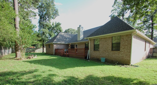 4707 Glen Valley Dr, Little Rock, AR 72223 - back of house featuring a chimney, a fenced backyard, brick siding, and a wooden deck